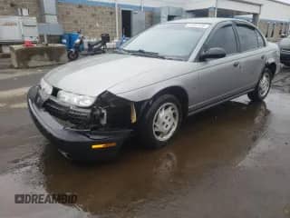 1996 Saturn SL with VIN 1G8ZK5272TZ265571, listed as a Copart auction lot 51267475 with 142,824 mi miles and Salvage title. Bid and sale history available at DreamBid. Image 1.