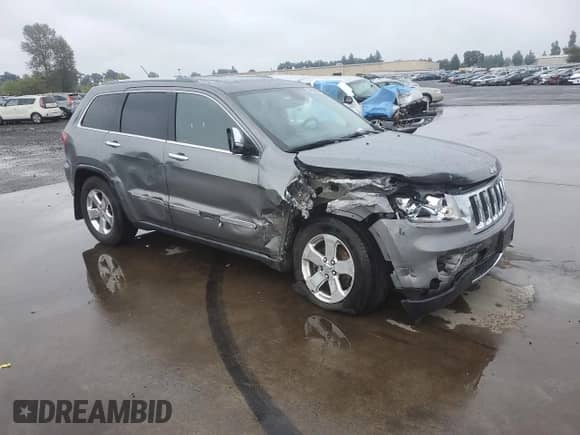 2012 Jeep Grand Cherokee Limited z VIN 1C4RJFBG2CC187150, wystawiony jako Copart lot #84956805 z przebiegiem 136 040 mil mil oraz Szkoda całkowita • Salvage title. Historia ofert i sprzedaży dostępna na DreamBid. Obrazek 4.