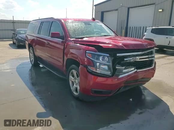 2015 Chevrolet Suburban LT with VIN 1GNSKJKC2FR643607, listed as a Copart auction lot 63677675 with 151,061 mi miles and Salvage title. Bid and sale history available at DreamBid. Image 14.