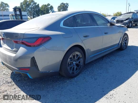 2024 BMW i4 eDrive40 with VIN WBY73AW0XRFR85807, listed as a IAAI auction lot 42009581 with 11,627 mi miles and . Bid and sale history available at DreamBid. Image 4.