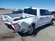 2025 Ram 1500 Big Horn with VIN 1C6RRFFG9SN509893, listed as a IAAI auction lot 41817619 with 1,808 mi miles and . Bid and sale history available at DreamBid. Image 4.