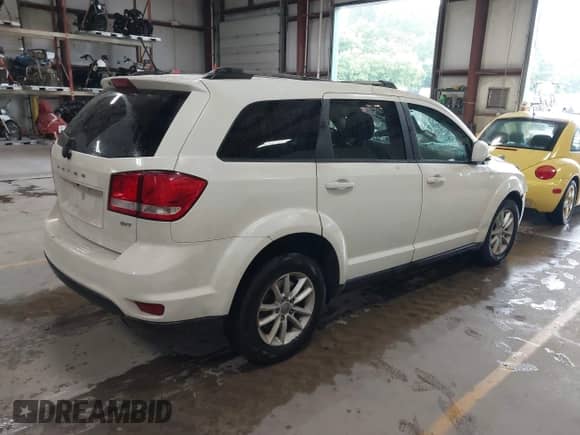 2017 Dodge Journey SXT with VIN 3C4PDDBG9HT618257, listed as a IAAI auction lot 42723139 with 105,486 mi miles and . Bid and sale history available at DreamBid. Image 4.