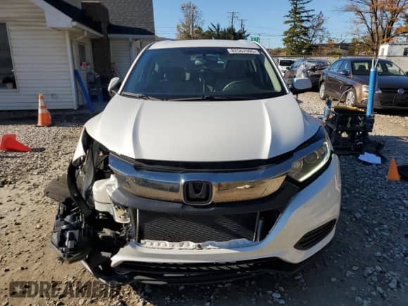 2022 Honda HR-V LX с VIN 3CZRU6H3XNM709045, выставлен на аукционе Copart как лот 82567595 с пробегом 73 623 миль миль и Списание • Salvage title. История ставок и продаж доступна на DreamBid. Изображение 5.