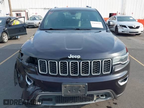 2018 Jeep Grand Cherokee Sterling with VIN 1C4RJFBT8JC326885, listed as a IAAI auction lot 43028769 with 124,755 mi miles and . Bid and sale history available at DreamBid. Image 6.