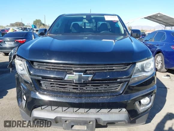 2016 Chevrolet Colorado 2WD Z71 with VIN 1GCHSDE34G1338688, listed as a IAAI auction lot 41291169 with Not provided miles and . Bid and sale history available at DreamBid. Image 12.