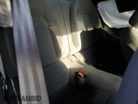 2021 Ford Mustang EcoBoost z VIN 1FA6P8TD6M5152477, wystawiony jako Copart lot #81250325 z przebiegiem 29 826 mil mil oraz Szkoda całkowita • Salvage title. Historia ofert i sprzedaży dostępna na DreamBid. Obrazek 10.