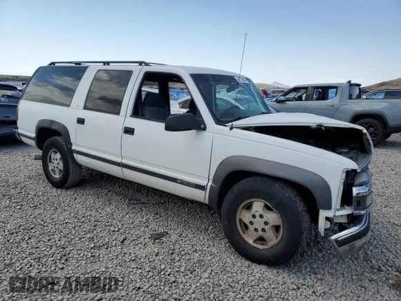 1995 Chevrolet Suburban z VIN 1GNFK16K0SJ450741, wystawiony jako Copart lot #62776695 z przebiegiem 224 984 mil mil oraz Szkoda całkowita • Salvage title. Historia ofert i sprzedaży dostępna na DreamBid. Obrazek 4.