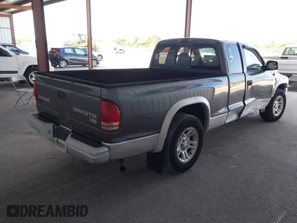 2004 Dodge Dakota SLT with VIN 1D7GL42K24S533320, listed as a IAAI auction lot 41741882 with 95,035 mi miles and . Bid and sale history available at DreamBid. Image 4.