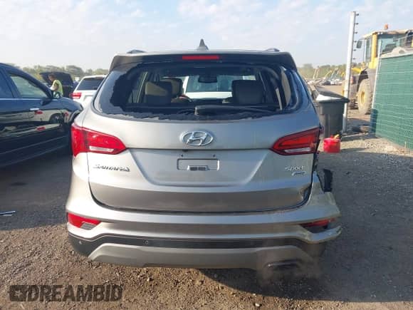 2018 Hyundai Santa Fe 2.4L with VIN 5XYZUDLB0JG570723, listed as a IAAI auction lot 43233197 with 81,248 mi miles and . Bid and sale history available at DreamBid. Image 16.