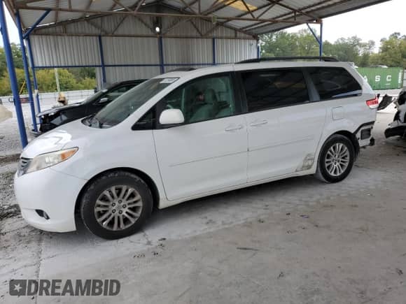 2012 Toyota Sienna XLE with VIN 5TDYK3DC8CS205280, listed as a Copart auction lot 81258065 with 185,820 mi miles and Salvage title. Bid and sale history available at DreamBid. Image 1.
