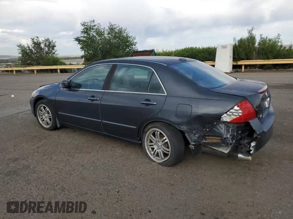 2006 Honda Accord EX-L with VIN 1HGCM65556A004509, listed as a Copart auction lot 60294005 with 147,567 mi miles and Salvage title. Bid and sale history available at DreamBid. Image 2.