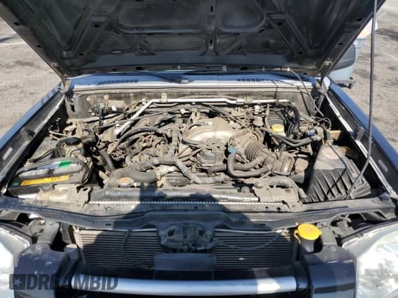 2004 Nissan Frontier XE with VIN 1N6ED27T64C477426, listed as a Copart auction lot 68329535 with 132,259 mi miles and Salvage title. Bid and sale history available at DreamBid. Image 11.