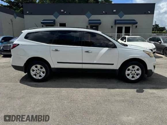 2016 Chevrolet Traverse LS z VIN 1GNKRFED2GJ236027, wystawiony jako Copart lot #49929765 z przebiegiem 117 234 mil mil oraz Szkoda całkowita • Salvage title. Historia ofert i sprzedaży dostępna na DreamBid. Obrazek 13.