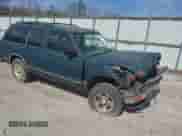 1994 Chevrolet Blazer z VIN 1GNCS13W3R0180933, wystawiony jako IAAI lot #41823501 z przebiegiem 259 563 mil mil oraz . Historia ofert i sprzedaży dostępna na DreamBid. Obrazek 1.