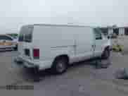 2005 Ford Econoline Cargo with VIN 1FTRE14W75HA41442, listed as a IAAI auction lot 42438411 with 197,241 mi miles and . Bid and sale history available at DreamBid. Image 4.