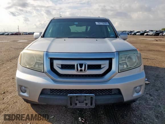 2011 Honda Pilot Touring z VIN 5FNYF3H97BB017646, wystawiony jako Copart lot #70779255 z przebiegiem 219 787 mil mil oraz Czysty tytuł • Clean title. Historia ofert i sprzedaży dostępna na DreamBid. Obrazek 5.