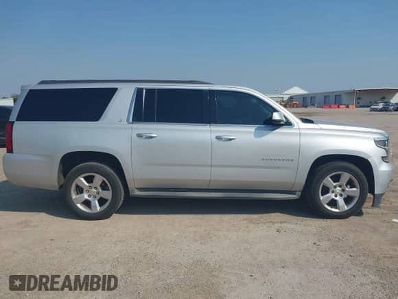 2015 Chevrolet Suburban LT with VIN 1GNSCJKC9FR271308, listed as a IAAI auction lot 42896617 with 202,547 mi miles and . Bid and sale history available at DreamBid. Image 13.