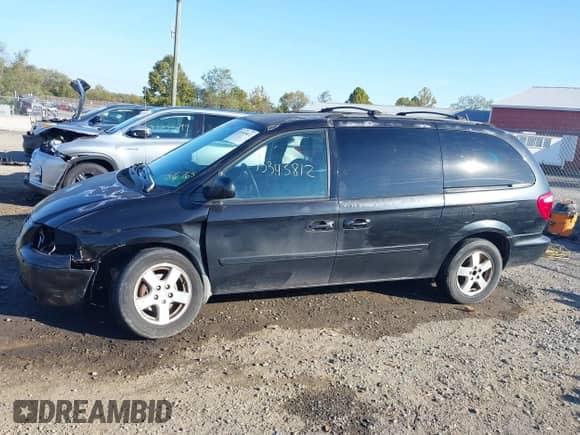 2007 Dodge Grand Caravan SXT with VIN 2D4GP44L57R306765, listed as a IAAI auction lot 43345812 with 175,291 mi miles and . Bid and sale history available at DreamBid. Image 14.