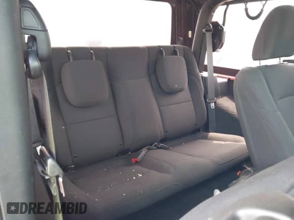 2023 Jeep Wrangler Sport with VIN 1C4HJXAG1PW692362, listed as a IAAI auction lot 42659087 with 52,179 mi miles and . Bid and sale history available at DreamBid. Image 8.