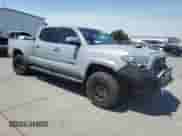 2018 Toyota Tacoma SR5 с VIN 3TMBZ5DN1JM013291, выставлен на аукционе Copart как лот 64250585 с пробегом 95 044 миль миль и Списание • Salvage title. История ставок и продаж доступна на DreamBid. Изображение 4.