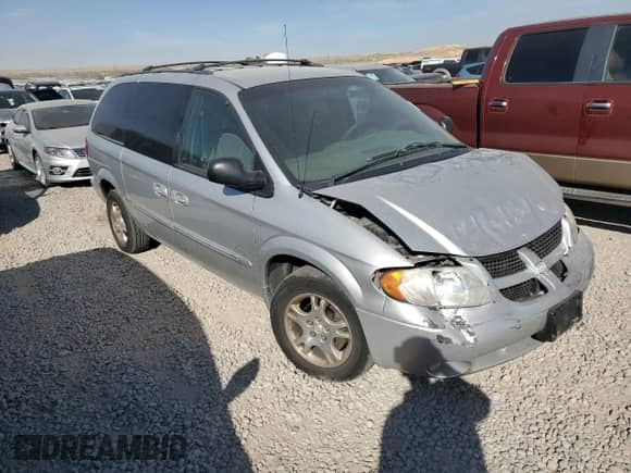 2001 Dodge Caravan ES with VIN 2B8GP54L01R107581, listed as a Copart auction lot 75209744 with 93,086 mi miles and Salvage title. Bid and sale history available at DreamBid. Image 4.