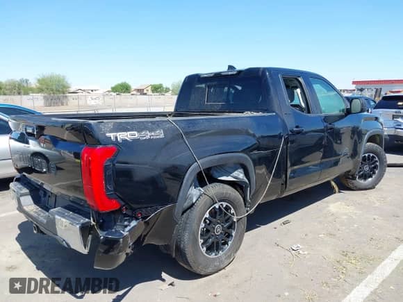 2023 Toyota Tundra SR5 with VIN 5TFLA5DA8PX100567, listed as a IAAI auction lot 42595561 with Not provided miles and . Bid and sale history available at DreamBid. Image 4.