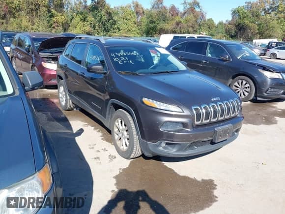 2014 Jeep Cherokee Latitude z VIN 1C4PJMCS3EW203811, wystawiony jako IAAI lot #43485562 z przebiegiem 152 937 mil mil oraz . Historia ofert i sprzedaży dostępna na DreamBid. Obrazek 1.