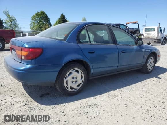 2001 Saturn SL with VIN 1G8ZK547X1Z294553, listed as a Copart auction lot 53786805 with 288,011 mi miles and Salvage title. Bid and sale history available at DreamBid. Image 3.