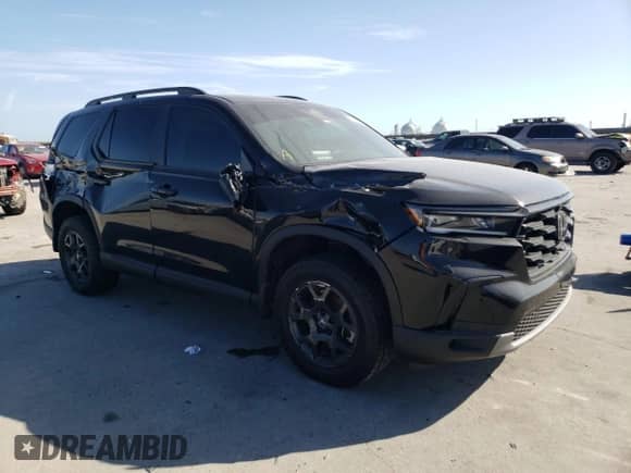 2023 Honda Pilot TrailSport with VIN 5FNYG1H66PB058087, listed as a Copart auction lot 84754824 with 26,278 mi miles and Salvage title. Bid and sale history available at DreamBid. Image 4.
