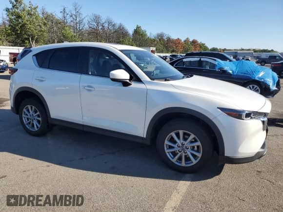 2023 Mazda CX-5 S Preferred z VIN JM3KFBCM1P0243111, wystawiony jako Copart lot #80721845 z przebiegiem 19 891 mil mil oraz Szkoda całkowita • Salvage title. Historia ofert i sprzedaży dostępna na DreamBid. Obrazek 4.