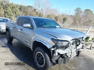 2024 Toyota Tacoma SR5 with VIN 3TMLB5JN4RM022026, listed as a IAAI auction lot 41409069 with 20,354 mi miles and . Bid and sale history available at DreamBid. Image 1.