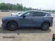 2023 Mazda CX-5 S Carbon Edition z VIN JM3KFBCM5P0179462, wystawiony jako IAAI lot #42451109 z przebiegiem 14 170 mil mil oraz . Historia ofert i sprzedaży dostępna na DreamBid. Obrazek 14.