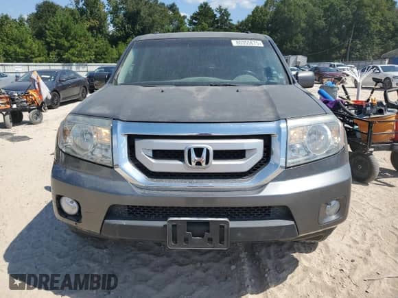 2011 Honda Pilot EX-L z VIN 5FNYF3H6XBB031109, wystawiony jako Copart lot #80355675 z przebiegiem 195 577 mil mil oraz Czysty tytuł • Clean title. Historia ofert i sprzedaży dostępna na DreamBid. Obrazek 5.