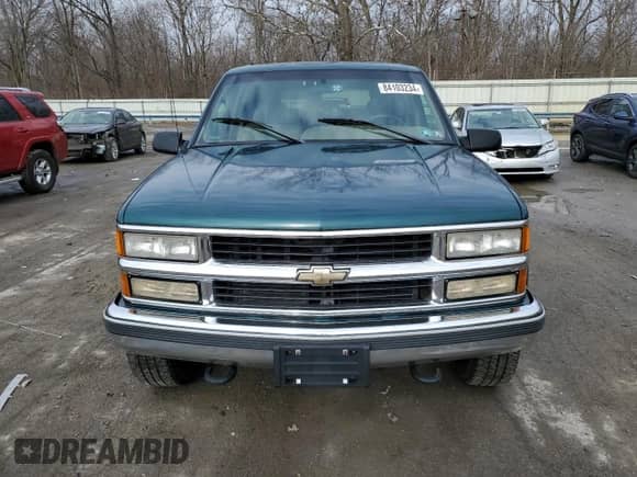 1995 Chevrolet Suburban с VIN 1GNGK26K8SJ406190, выставлен на аукционе Copart как лот 84103234 с пробегом 145 731 миль миль и Чистый • Clean title. История ставок и продаж доступна на DreamBid. Изображение 5.