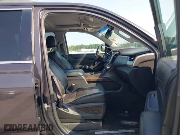 2016 Chevrolet Suburban LT with VIN 1GNSKHKC5GR391281, listed as a IAAI auction lot 43153704 with 199,019 mi miles and . Bid and sale history available at DreamBid. Image 5.