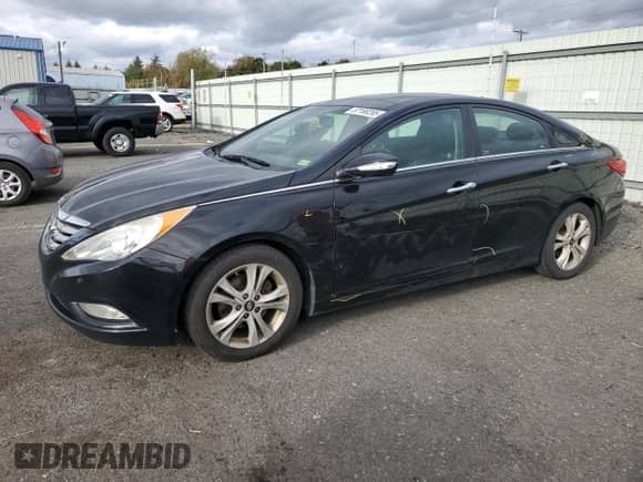 2012 Hyundai Sonata Limited с VIN 5NPEC4AC5CH350003, выставлен на аукционе Copart как лот 87188285 с пробегом 159 542 миль миль и Списание • Salvage title. История ставок и продаж доступна на DreamBid. Изображение 1.