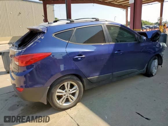 2013 Hyundai Tucson GLS z VIN KM8JU3AC0DU615712, wystawiony jako Copart lot #67273215 z przebiegiem Nie podano mil oraz Szkoda całkowita • Salvage title. Historia ofert i sprzedaży dostępna na DreamBid. Obrazek 3.