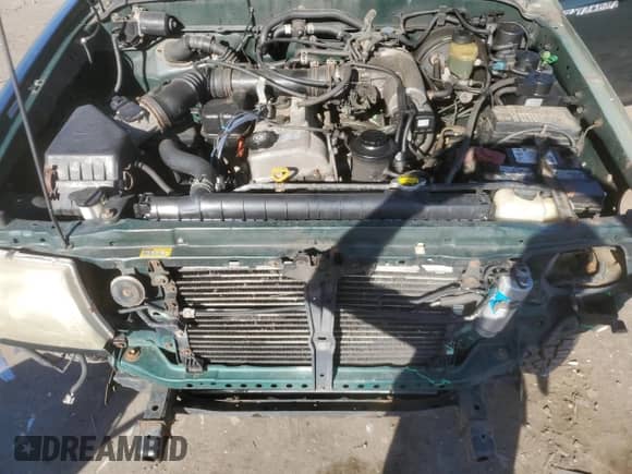 1999 Toyota Tacoma with VIN 4TAPM62N8XZ555830, listed as a Copart auction lot 82578465 with 175,853 mi miles and Salvage title. Bid and sale history available at DreamBid. Image 11.