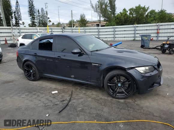 2009 BMW M3 with VIN WBSPM93509E201341, listed as a Copart auction lot 52716035 with 140,526 mi miles and Salvage title. Bid and sale history available at DreamBid. Image 4.