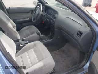 1996 Chevrolet Prizm z VIN 1Y1SK5283TZ057095, wystawiony jako IAAI lot #41676394 z przebiegiem 199 114 mil mil oraz . Historia ofert i sprzedaży dostępna na DreamBid. Obrazek 5.