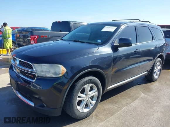 2013 Dodge Durango SXT with VIN 1C4RDHAGXDC680418, listed as a IAAI auction lot 42851105 with 149,216 mi miles and . Bid and sale history available at DreamBid. Image 2.