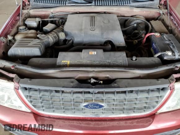 2002 Ford Explorer XLT with VIN 1FMDU73W92UD65394, listed as a Copart auction lot 84193475 with 186,911 mi miles and Salvage title. Bid and sale history available at DreamBid. Image 12.