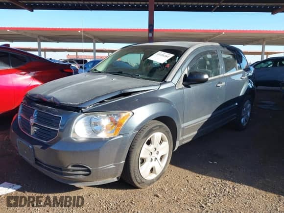 2007 Dodge Caliber SXT with VIN 1B3HB48B47D340900, listed as a IAAI auction lot 43326284 with 77,817 mi miles and . Bid and sale history available at DreamBid. Image 2.