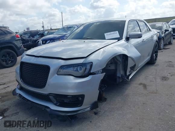 2021 Chrysler 300 S with VIN 2C3CCABG9MH506145, listed as a IAAI auction lot 42443424 with 119,394 mi miles and . Bid and sale history available at DreamBid. Image 2.