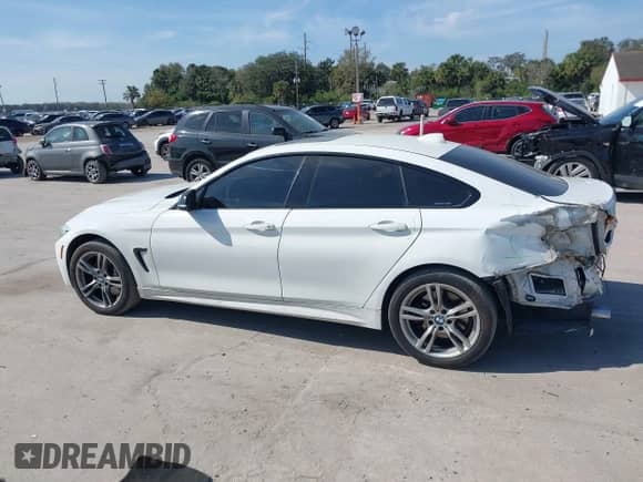 2016 BMW 4 Series 435i xDrive z VIN WBA4B3C58GG528016, wystawiony jako IAAI lot #41506077 z przebiegiem 87 975 mil mil oraz . Historia ofert i sprzedaży dostępna na DreamBid. Obrazek 14.