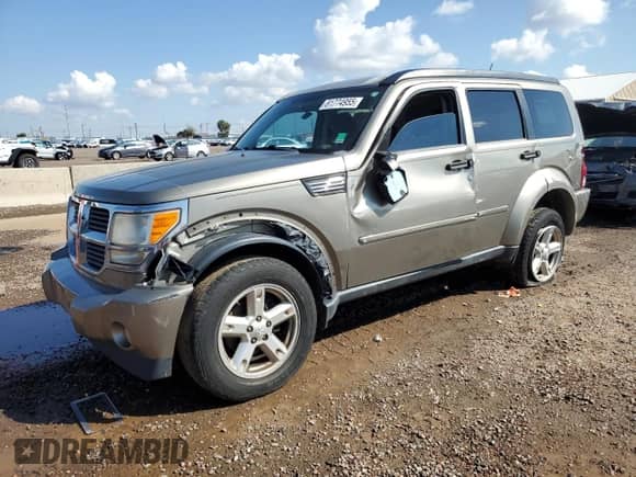 2007 Dodge Nitro SXT с VIN 1D8GU28K17W656995, выставлен на аукционе Copart как лот 81774955 с пробегом 218 133 миль миль и Списание • Salvage title. История ставок и продаж доступна на DreamBid. Изображение 1.