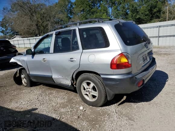 2002 Hyundai Santa Fe GLS z VIN KM8SC13D22U233146, wystawiony jako Copart lot #80273844 z przebiegiem 213 822 mil mil oraz Szkoda całkowita • Salvage title. Historia ofert i sprzedaży dostępna na DreamBid. Obrazek 2.