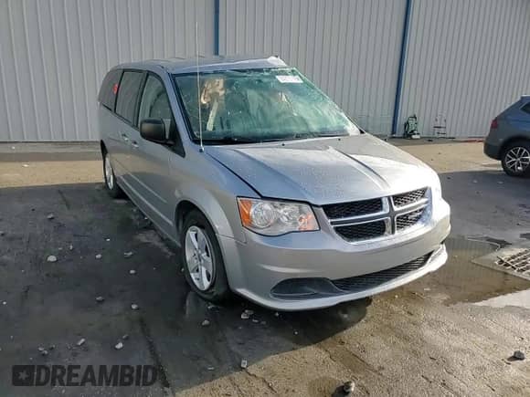 2017 Dodge Grand Caravan SE with VIN 2C4RDGBG2HR624852, listed as a Copart auction lot 84373115 with 141,702 mi miles and Salvage title. Bid and sale history available at DreamBid. Image 14.