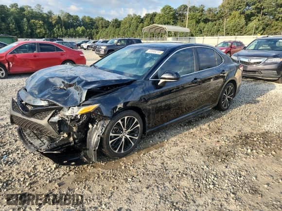 2019 Toyota Camry LE с VIN 4T1B11HK9KU788690, выставлен на аукционе Copart как лот 72049215 с пробегом 125 723 миль миль и Списание • Salvage title. История ставок и продаж доступна на DreamBid. Изображение 1.