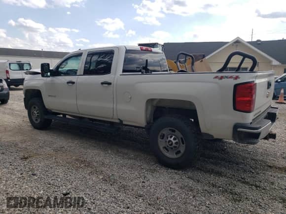 2017 Chevrolet Silverado 2500HD Work Truck with VIN 1GC1KUEG5HF114256, listed as a Copart auction lot 54135265 with 176,889 mi miles and Salvage title. Bid and sale history available at DreamBid. Image 2.